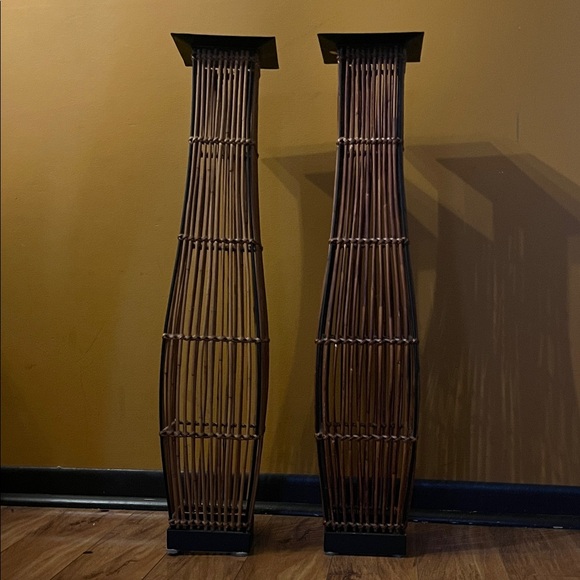 Tall Brown bamboo candle holders.